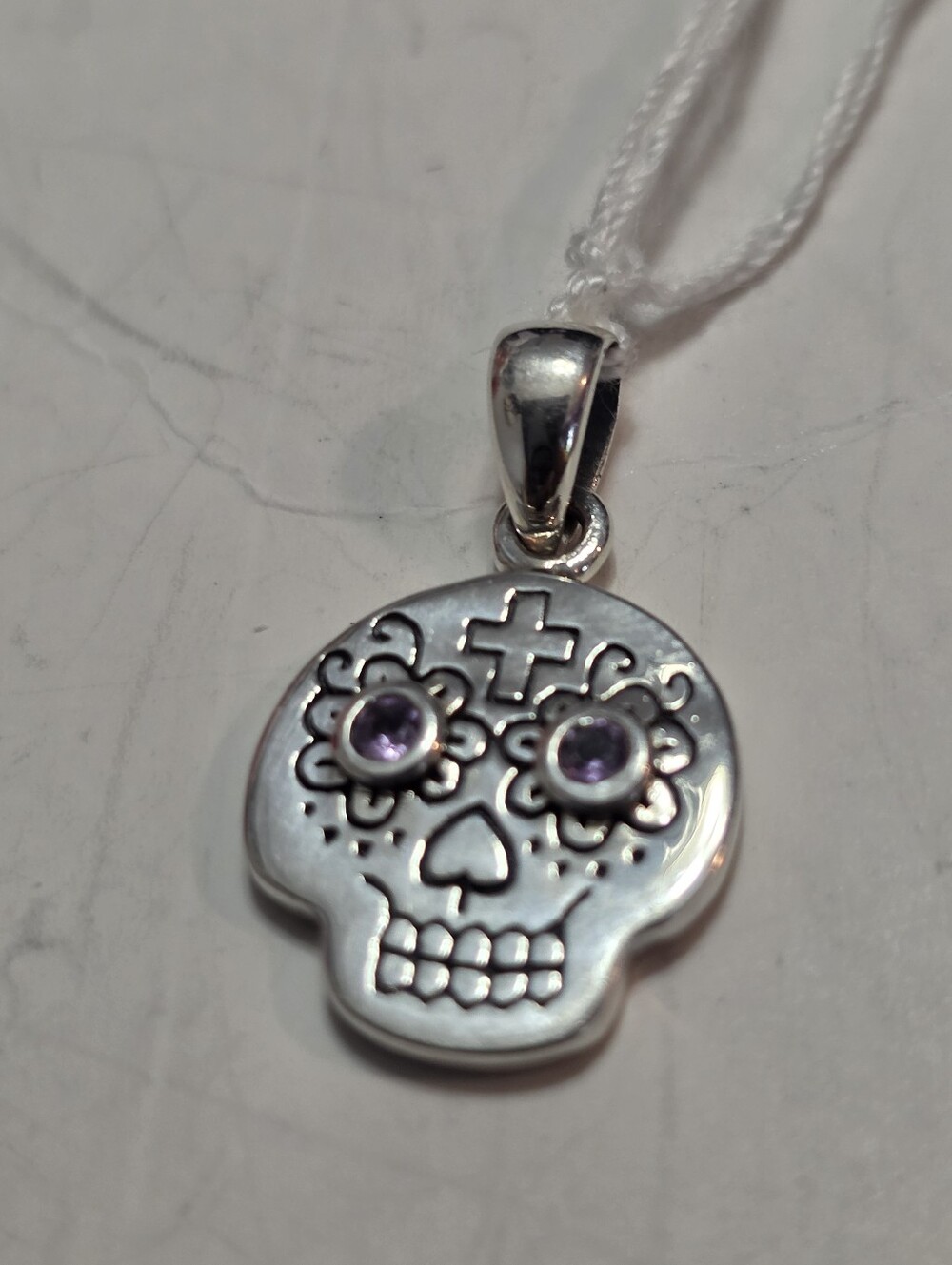 Silver Voodoo Skull Pendant Necklace with Purple Stone Eyes